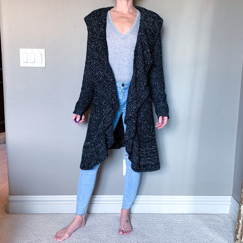 Sioni Long white speckled black cardigan.